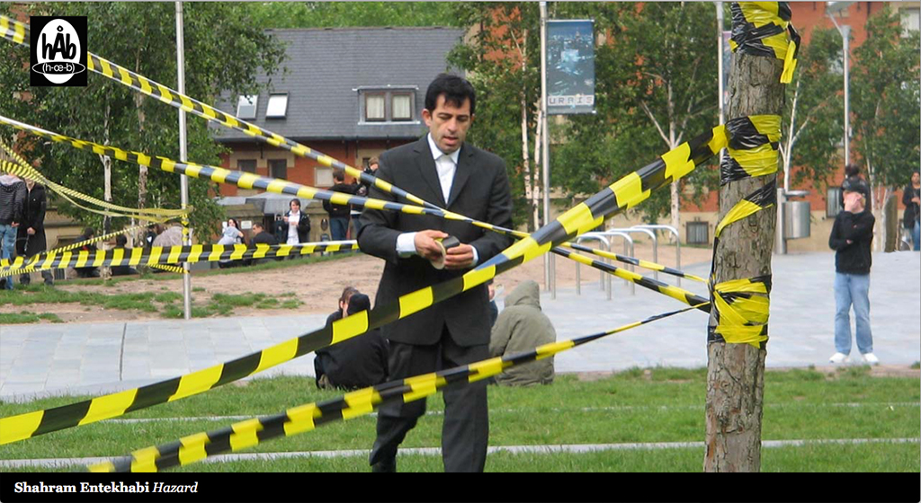 Hazard 2007 , Sculpture and Performances Festival in Manchester City, UK3000 Meters of Caution Tape, Enclosed the Cathedral Gardens in Manchester city centre by : Shahram Entekhabi