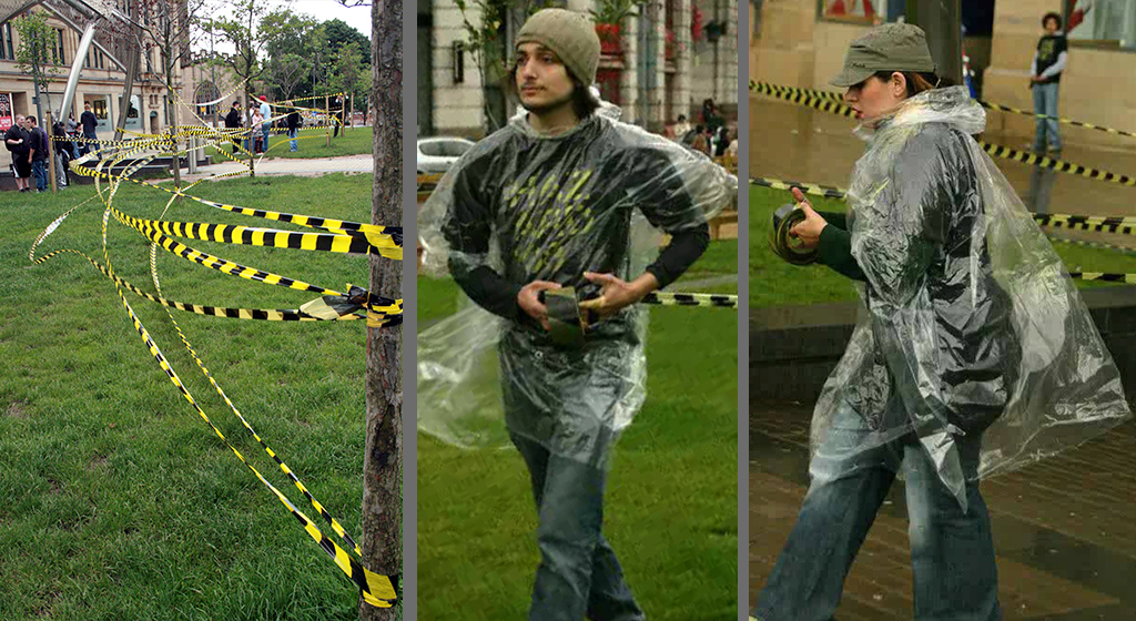 Hazard 2008 , Sculpture and Performances Festival in Manchester City, UK3000 Meters of Caution Tape, Enclosed the Cathedral Gardens in Manchester city centre by : Shahram Entekhabi